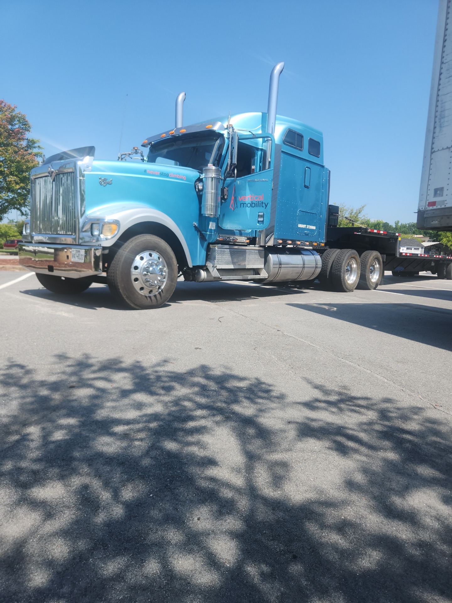 VMC tractor trailer for crane mobilization and transport