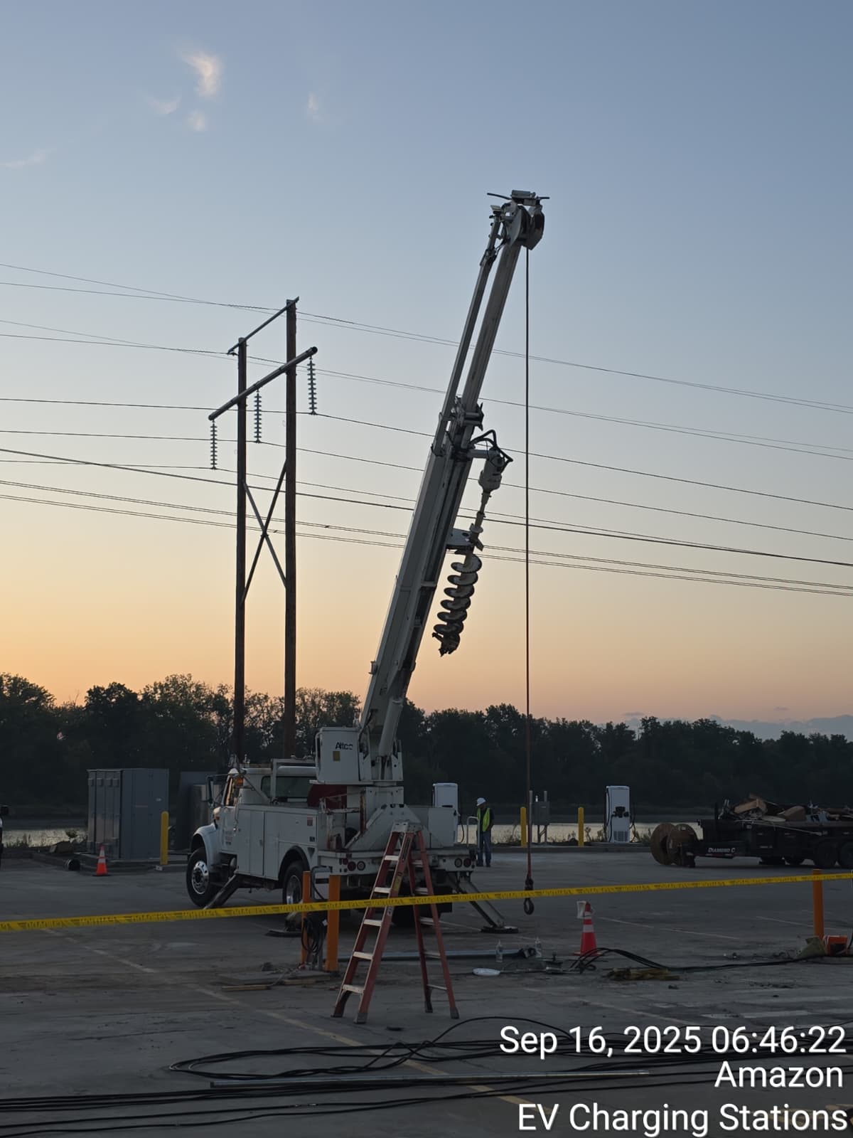 VMC auger truck at EV charging station installation