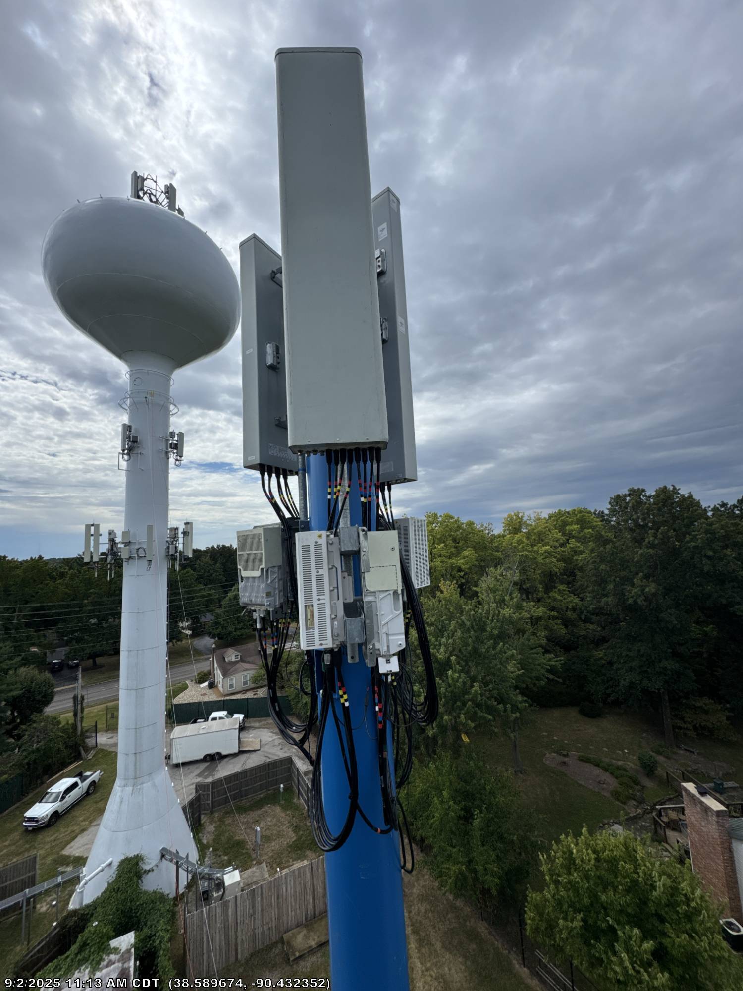 Temporary tower antenna sector close-up showing radios and cabling