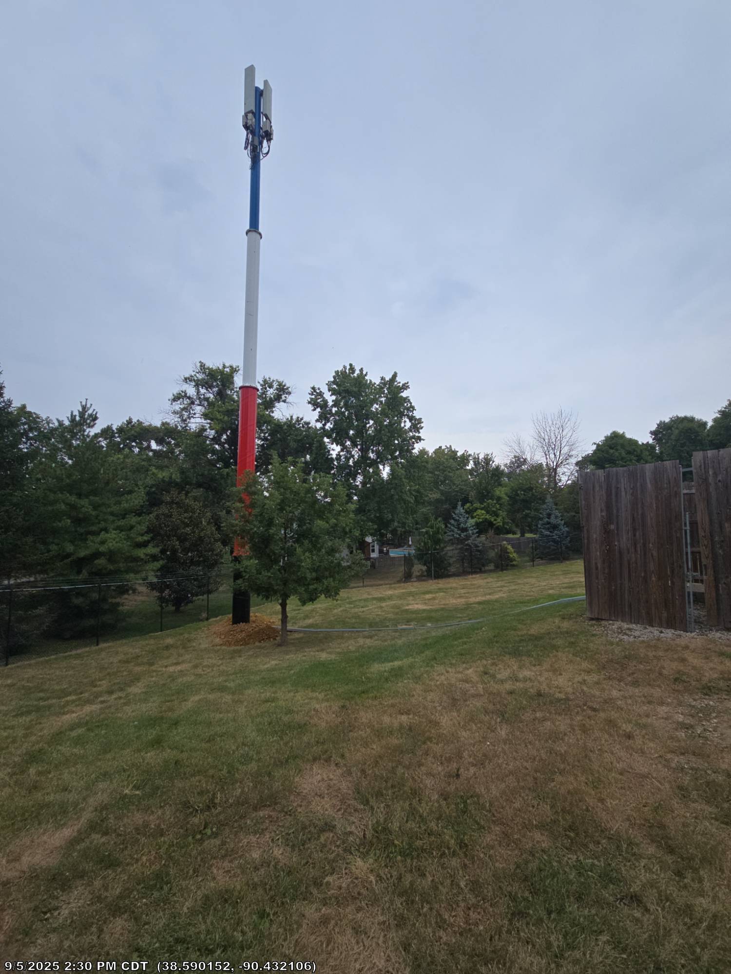 Temporary tower deployed near water tower