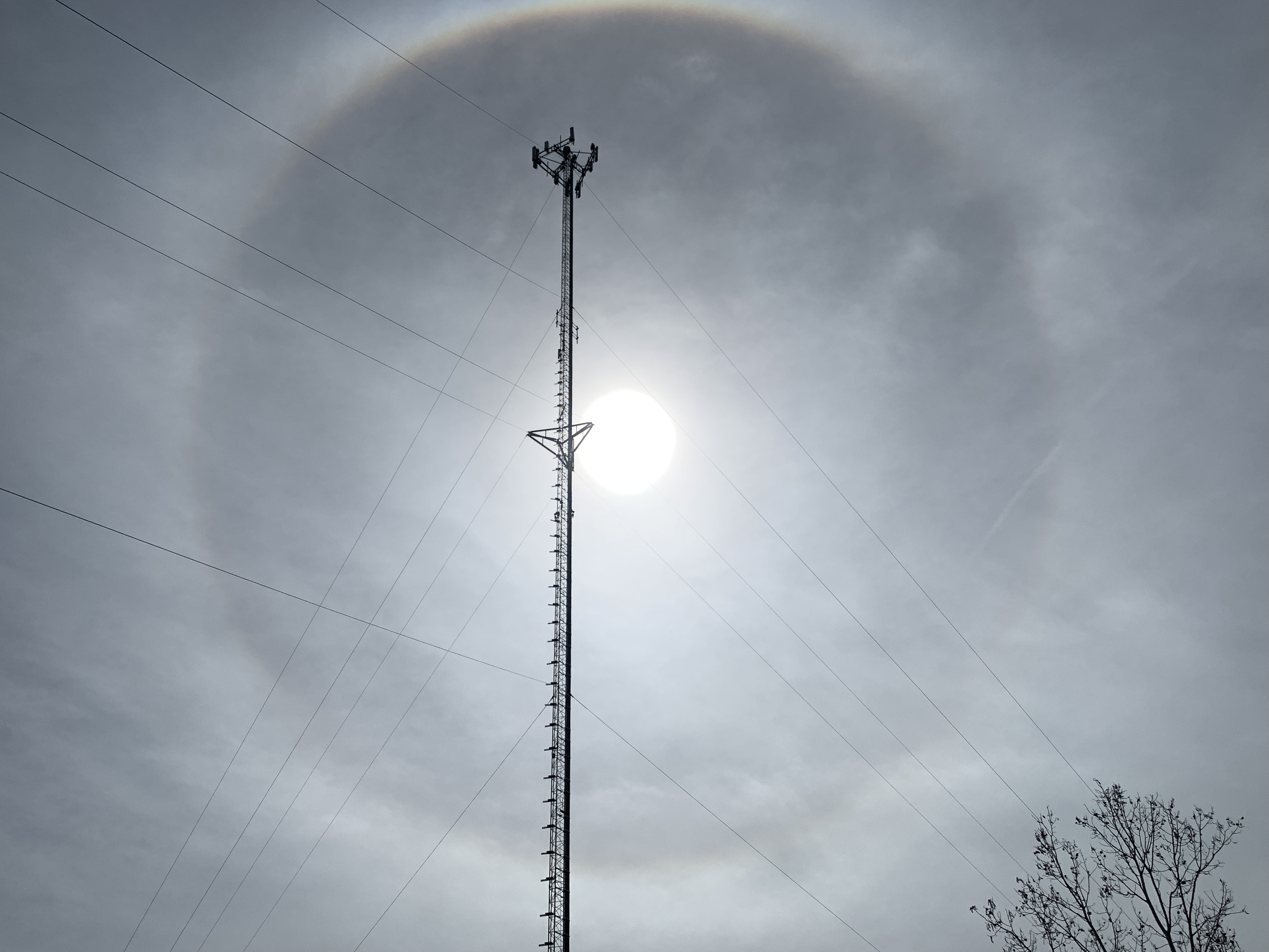 Tower silhouette with sun halo